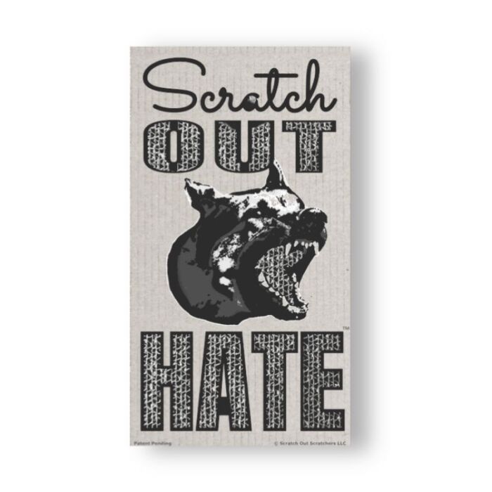 Scratch Out Scatcher, cardboard woodcut design featuring a snarling dog.